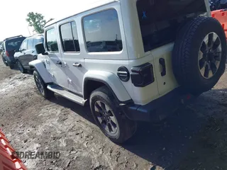 2018 Jeep Wrangler Unlimited Sahara z VIN 1C4HJXEG0JW321355, wystawiony jako IAAI lot #42343112 z przebiegiem 102 457 mil mil oraz . Historia ofert i sprzedaży dostępna na DreamBid. Obrazek 3.