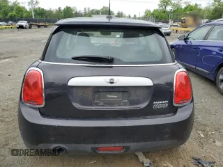 2014 MINI Hardtop with VIN WMWXM5C57ET932920, listed as a Copart auction lot 55810575 with 73,151 mi miles and Salvage title. Bid and sale history available at DreamBid. Image 6.