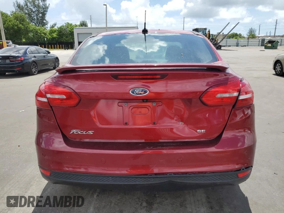 2015 Ford Focus SE z VIN 1FADP3F24FL332883, wystawiony jako Copart lot #64429655 z przebiegiem 65 939 mil mil oraz Szkoda całkowita • Salvage title. Historia ofert i sprzedaży dostępna na DreamBid. Obrazek 6.