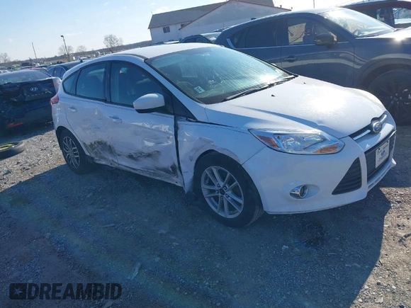 2012 Ford Focus SE z VIN 1FAHP3K29CL265135, wystawiony jako IAAI lot #40989480 z przebiegiem 158 742 mil mil oraz . Historia ofert i sprzedaży dostępna na DreamBid. Obrazek 1.