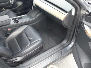 2023 Tesla Model 3 z VIN 5YJ3E1EA1PF449575, wystawiony jako IAAI lot #42457119 z przebiegiem 51 084 mil mil oraz . Historia ofert i sprzedaży dostępna na DreamBid. Obrazek 5.