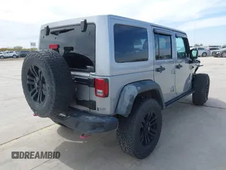 2015 Jeep Wrangler Unlimited Rubicon Hard Rock с VIN 1C4HJWFG6FL762537, выставлен на аукционе IAAI как лот 41792066 с пробегом 125 829 миль миль и . История ставок и продаж доступна на DreamBid. Изображение 4.