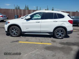 2017 BMW X1 xDrive28i with VIN WBXHT3C33H5F86831, listed as a IAAI auction lot 42019082 with 74,708 mi miles and . Bid and sale history available at DreamBid. Image 14.