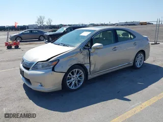 2011 Lexus HS 250h with VIN JTHBB1BA6B2047554, listed as a IAAI auction lot 41909454 with 128,500 mi miles. Bid and sale history available at carsss.com. Image 2.