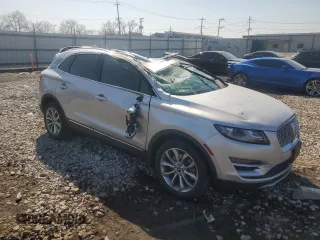 2019 Lincoln MKC Select with VIN 5LMCJ2D93KUL03390, listed as a Copart auction lot 49171235 with 63,417 mi miles and Salvage title. Bid and sale history available at DreamBid. Image 4.