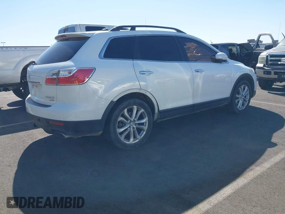 2012 Mazda CX-9 Grand Touring z VIN JM3TB3DA5C0349176, wystawiony jako IAAI lot #41960691 z przebiegiem 207 445 mil mil oraz . Historia ofert i sprzedaży dostępna na DreamBid. Obrazek 4.