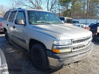 2004 Chevrolet Tahoe LS with VIN 1GNEC13V24R140604, listed as a IAAI auction lot 41393364 with 153,778 mi miles. Bid and sale history available at carsss.com. Image 1.