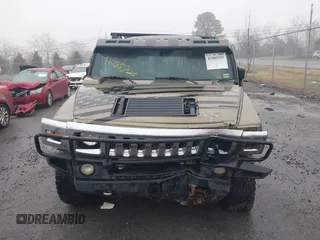 2005 Hummer H2 SUV with VIN 5GRGN23U35H130615, listed as a IAAI auction lot 41085325 with 138,393 mi miles. Bid and sale history available at carsss.com. Image 12.