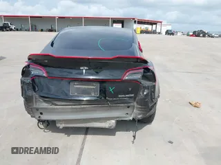 2023 Tesla Model 3 z VIN 5YJ3E1EA5PF484040, wystawiony jako IAAI lot #42128327 z przebiegiem 51 210 mil mil oraz . Historia ofert i sprzedaży dostępna na DreamBid. Obrazek 16.