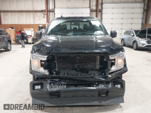 2020 Ford F-150 XL with VIN 1FTEW1EP7LFA52999, listed as a IAAI auction lot 42395772 with 75,709 mi miles and . Bid and sale history available at DreamBid. Image 12.