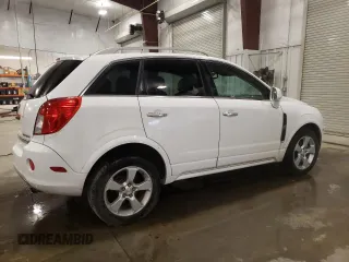 2014 Chevrolet Captiva Sport LT with VIN 3GNAL3EK4ES661268, listed as a Copart auction lot 74895224 with 128,513 mi miles and Salvage Title. Bid and sale history available at DreamBid. Image 3.