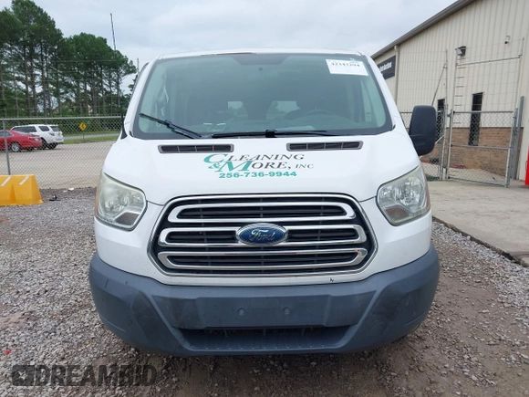 2015 Ford Transit Cargo with VIN 1FTNR1ZM7FKA88758, listed as a IAAI auction lot 42343294 with 133,914 mi miles and . Bid and sale history available at DreamBid. Image 12.