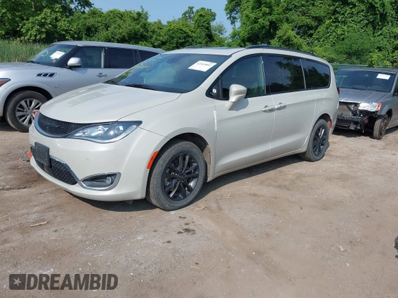 2020 Chrysler Pacifica Launch Edition with VIN 2C4RC3BGXLR267876, listed as a IAAI auction lot 42424841 with 87,586 mi miles and . Bid and sale history available at DreamBid. Image 18.