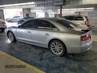 2011 Audi A8 с VIN WAUAVAFD2BN024177, выставлен на аукционе Copart как лот 88783655 с пробегом 130 086 миль миль и Списание • Salvage title. История ставок и продаж доступна на DreamBid. Изображение 2.