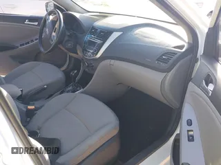 2015 Hyundai Accent Sport with VIN KMHCU5AE9FU205662, listed as a IAAI auction lot 41384496 with 80,133 mi miles. Bid and sale history available at carsss.com. Image 5.