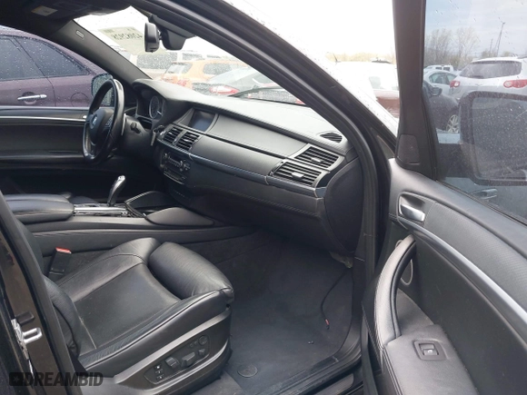 2012 BMW X6 M with VIN 5YMGZ0C58CLK14885, listed as a IAAI auction lot 42082928 with 131,900 mi miles. Bid and sale history available at carsss.com. Image 5.
