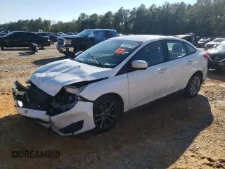 2018 Ford Focus SE with VIN 1FADP3F23JL220312, listed as a Copart auction lot 46903995 with 128,549 mi miles and Salvage Title. Bid and sale history available at carsss.com. Image 1.