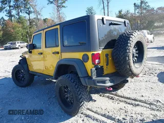 2015 Jeep Wrangler Unlimited Rubicon z VIN 1C4BJWFG4FL681946, wystawiony jako IAAI lot #40809597 z przebiegiem 57 148 mil mil oraz . Historia ofert i sprzedaży dostępna na DreamBid. Obrazek 3.