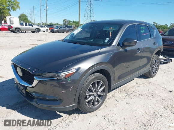 2018 Mazda CX-5 Grand Touring with VIN JM3KFBDM8J0314925, listed as a IAAI auction lot 41825917 with 70,027 mi miles. Bid and sale history available at carsss.com. Image 18.