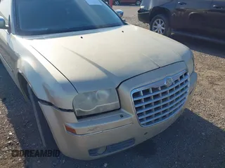 2010 Chrysler 300 Touring with VIN 2C3CA5CV0AH167992, listed as a IAAI auction lot 41985352 with 235,816 mi miles. Bid and sale history available at carsss.com. Image 6.