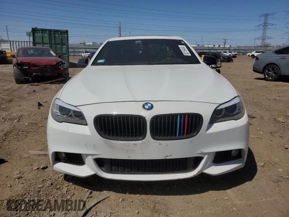 2013 BMW 5 Series 550i xDrive with VIN WBAFU9C52DDY71651, listed as a Copart auction lot 52156465 with 144,211 mi miles and Salvage title. Bid and sale history available at DreamBid. Image 5.