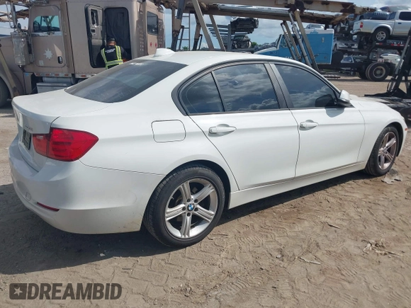 2015 BMW 3 Series 320i xDrive with VIN WBA3C3C58FK201748, listed as a IAAI auction lot 42678404 with 115,043 mi miles and . Bid and sale history available at DreamBid. Image 4.