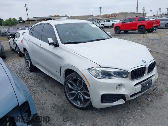 2018 BMW X6 xDrive35i with VIN 5UXKU2C5XJ0X50408, listed as a IAAI auction lot 41798784 with 69,134 mi miles. Bid and sale history available at carsss.com. Image 1.