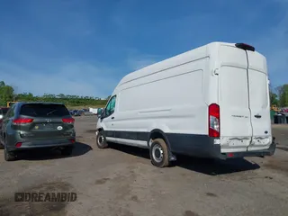 2021 Ford Transit Cargo z VIN 1FTBW3X84MKA60720, wystawiony jako IAAI lot #42202665 z przebiegiem 67 295 mil mil oraz . Historia ofert i sprzedaży dostępna na DreamBid. Obrazek 3.