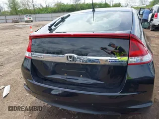 2014 Honda Insight EX z VIN JHMZE2H75ES001709, wystawiony jako IAAI lot #42086181 z przebiegiem 103 045 mil mil oraz . Historia ofert i sprzedaży dostępna na DreamBid. Obrazek 16.