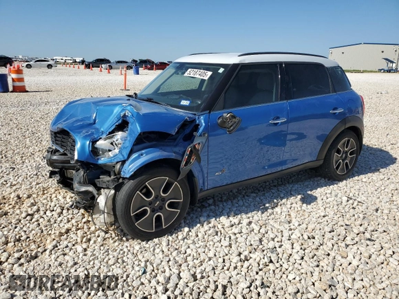 2011 MINI Countryman S with VIN WMWZC5C54BWL53955, listed as a Copart auction lot 52187405 with 124,470 mi miles and Salvage Title. Bid and sale history available at DreamBid. Image 1.