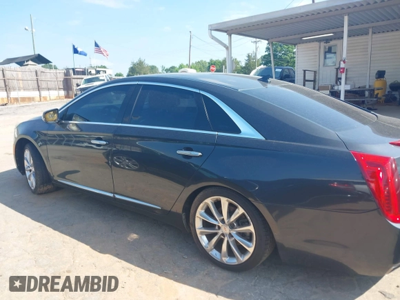 2013 Cadillac XTS Luxury z VIN 2G61P5S37D9110658, wystawiony jako IAAI lot #42196442 z przebiegiem 182 228 mil mil oraz . Historia ofert i sprzedaży dostępna na DreamBid. Obrazek 15.
