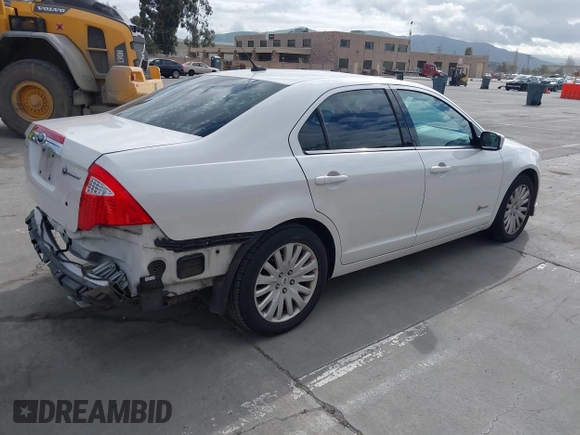 2010 Ford Fusion Hybrid with VIN 3FADP0L36AR140242, listed as a IAAI auction lot 41895012 with 236,943 mi miles and . Bid and sale history available at DreamBid. Image 4.