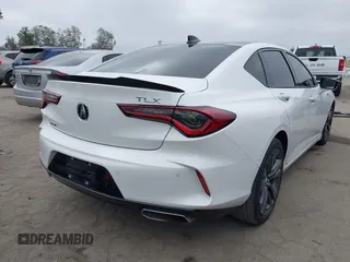 2022 Acura TLX w/A-Spec Package with VIN 19UUB5F59NA001954, listed as a IAAI auction lot 42368946 with 25,685 mi miles and . Bid and sale history available at DreamBid. Image 4.