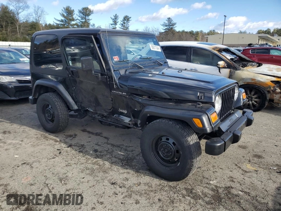2002 Jeep Wrangler SE with VIN 1J4FA29P82P732805, listed as a Copart auction lot 86017044 with 138,679 mi miles and Salvage Title. Bid and sale history available at DreamBid. Image 4.