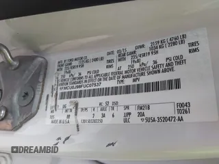 2015 Ford Escape Titanium with VIN 1FMCU0J98FUC07537, listed as a IAAI auction lot 41440462 with 233,924 mi miles. Bid and sale history available at carsss.com. Image 9.