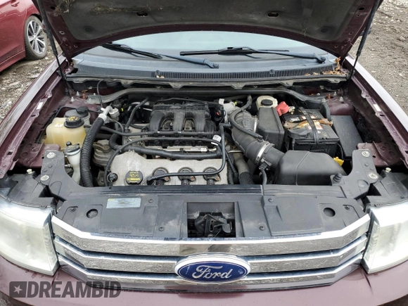 2011 Ford Flex SEL z VIN 2FMGK5CC5BBD18866, wystawiony jako Copart lot #54371635 z przebiegiem 196 085 mil mil oraz Szkoda całkowita • Salvage title. Historia ofert i sprzedaży dostępna na DreamBid. Obrazek 12.