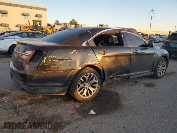 2015 Ford Taurus Limited with VIN 1FAHP2F88FG144487, listed as a Copart auction lot 42692205 with 147,597 mi miles and Salvage Title. Bid and sale history available at DreamBid. Image 3.