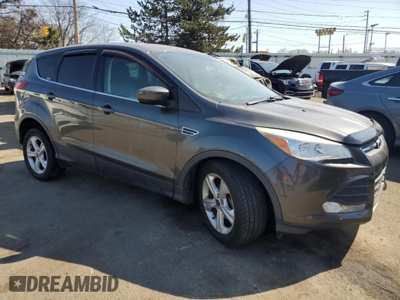 2015 Ford Escape SE with VIN 1FMCU0G7XFUC76610, listed as a Copart auction lot 48547655 with 109,901 mi miles and Salvage Title. Bid and sale history available at carsss.com. Image 4.