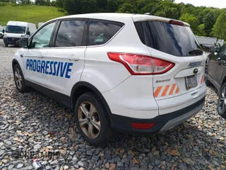 2014 Ford Escape SE z VIN 1FMCU9GX8EUC02895, wystawiony jako IAAI lot #42511705 z przebiegiem 104 900 mil mil oraz . Historia ofert i sprzedaży dostępna na DreamBid. Obrazek 24.