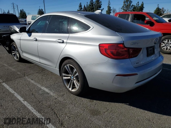 2018 BMW 3 Series 330i xDrive with VIN WBA8Z9C52JG828738, listed as a Copart auction lot 42131075 with 0 mi miles and Salvage Title. Bid and sale history available at carsss.com. Image 2.