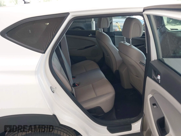 2018 Hyundai Tucson SE z VIN KM8J2CA44JU657178, wystawiony jako IAAI lot #42157871 z przebiegiem 130 715 mil mil oraz . Historia ofert i sprzedaży dostępna na DreamBid. Obrazek 8.