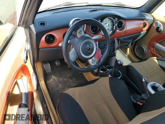 2006 MINI Convertible S with VIN WMWRH33576TF89127, listed as a Copart auction lot 49763365 with 150,446 mi miles and Salvage title. Bid and sale history available at DreamBid. Image 8.