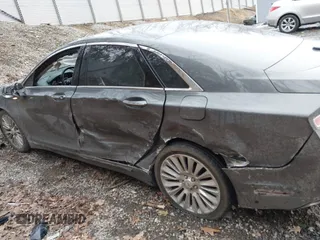 2015 Lincoln MKZ with VIN 3LN6L2J97FR616714, listed as a IAAI auction lot 41664184 with 116,495 mi miles and . Bid and sale history available at DreamBid. Image 6.