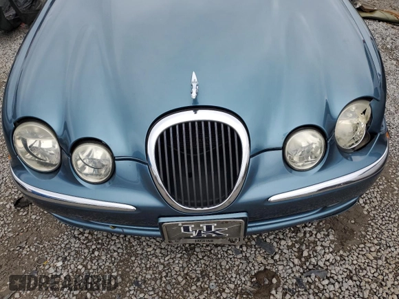 2000 Jaguar S-Type V6 z VIN SAJDA01C1YFL38878, wystawiony jako Copart lot #44323075 z przebiegiem 231 855 mil mil oraz Szkoda całkowita • Salvage title. Historia ofert i sprzedaży dostępna na DreamBid. Obrazek 11.
