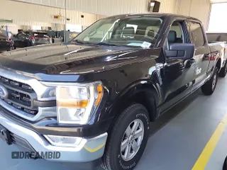2021 Ford F-150 XL with VIN 1FTFW1E52MFB64744, listed as a IAAI auction lot 42733866 with 98,411 mi miles and . Bid and sale history available at DreamBid. Image 22.