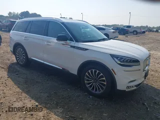 2021 Lincoln Aviator Reserve with VIN 5LM5J7WC2MGL01985, listed as a IAAI auction lot 42548458 with 57,623 mi miles and . Bid and sale history available at DreamBid. Image 1.