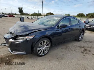 2021 Mazda 6 Signature with VIN JM1GL1XY7M1604474, listed as a Copart auction lot 39327544 with 6,252 mi miles and . Bid and sale history available at DreamBid. Image 1.