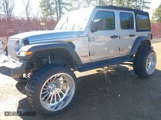 2019 Jeep Wrangler Unlimited Sport S with VIN 1C4HJXDN4KW599466, listed as a IAAI auction lot 41407578 with 77,312 mi miles. Bid and sale history available at carsss.com. Image 16.