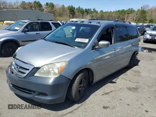 2006 Honda Odyssey EX-L z VIN 5FNRL38756B065972, wystawiony jako Copart lot #53795055 z przebiegiem 302 906 mil mil oraz Szkoda całkowita • Salvage title. Historia ofert i sprzedaży dostępna na DreamBid. Obrazek 1.