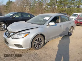 2016 Nissan Altima SR with VIN 1N4AL3AP2GC287591, listed as a IAAI auction lot 41758321 with 114,894 mi miles and . Bid and sale history available at carsss.com. Image 2.
